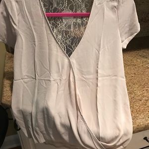 Women’s blouse with see through back